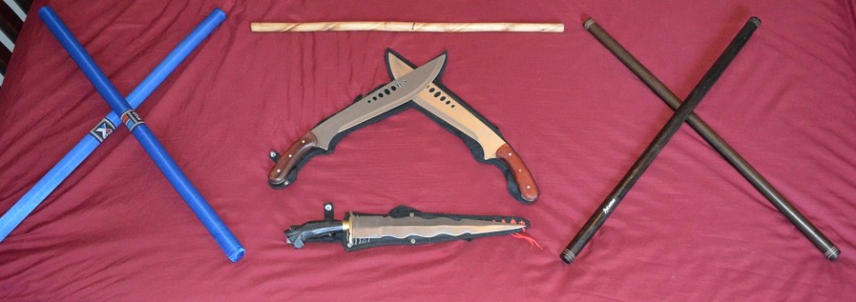 My own personal stash – hardwood sticks that are used in duels, padded sticks for competing, rattan stick for practise along with Kris and Bolo knives.